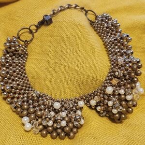 Elegant Gold and Pearl Statement Necklace
